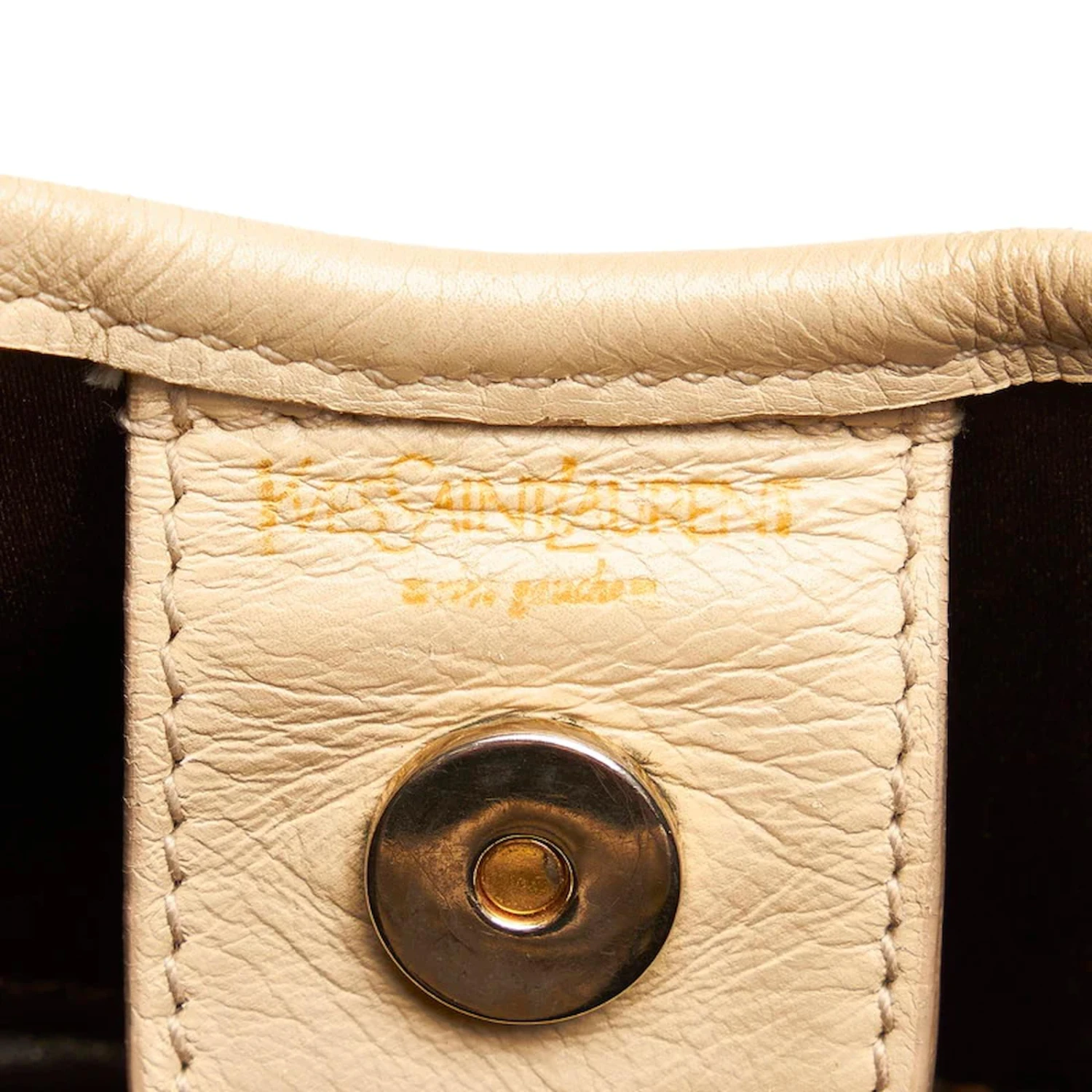 Yves Saint Laurent Sac à Bandoulière Fleuri Perforé En Cuir Beige 10 Yves Saint Laurent Sac à Bandoulière Fleuri Perforé En Cuir Beige – Image 8