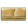 Yves Saint Laurent POCHETTE SAINT LAURENT EN CUIR DORE A RABAT FERMOIR YSL DORE INTERIEUR DAIM NOIR Doré 2 Yves Saint Laurent POCHETTE SAINT LAURENT EN CUIR DORE A RABAT FERMOIR YSL DORE INTERIEUR DAIM NOIR Doré -Yves Saint Laurent pochette saint laurent en cuir dore a rabat fermoir ysl dore interieur daim noir