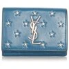 Yves Saint Laurent Portefeuille à Deux Volets En Relief YSL Blue Star Bleu 1 Yves Saint Laurent Portefeuille à Deux Volets En Relief YSL Blue Star Bleu -Yves Saint Laurent portefeuille a deux volets en relief ysl blue star yves saint laurent cuir